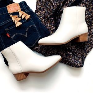 white vegan leather zipper ankle booties